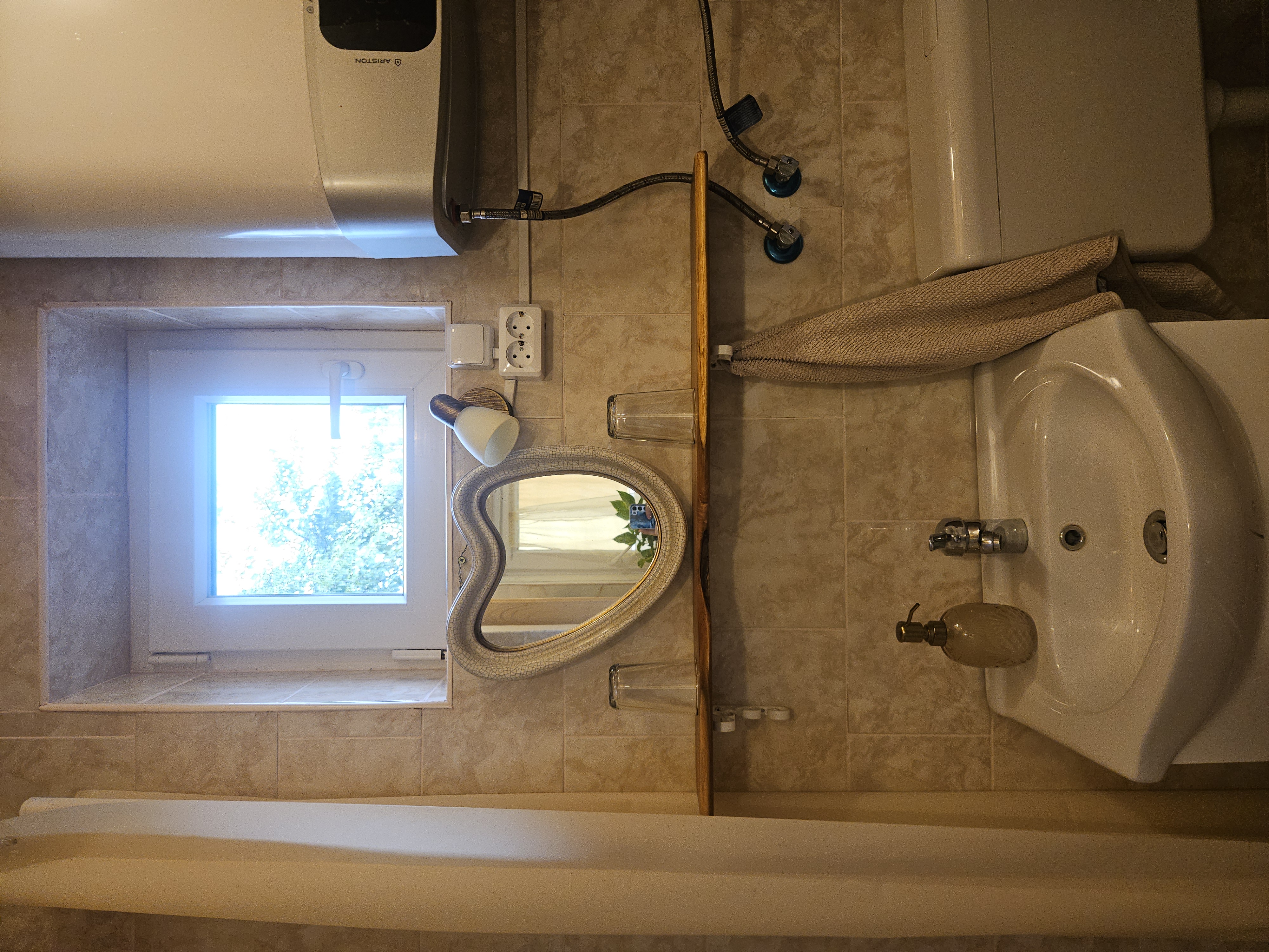 Bathroom with charming heart mirror